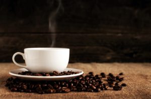 A steaming hot cup of coffee