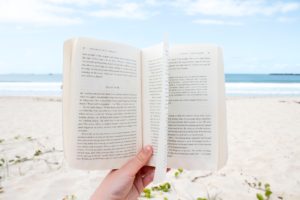 Reading a book at the beach